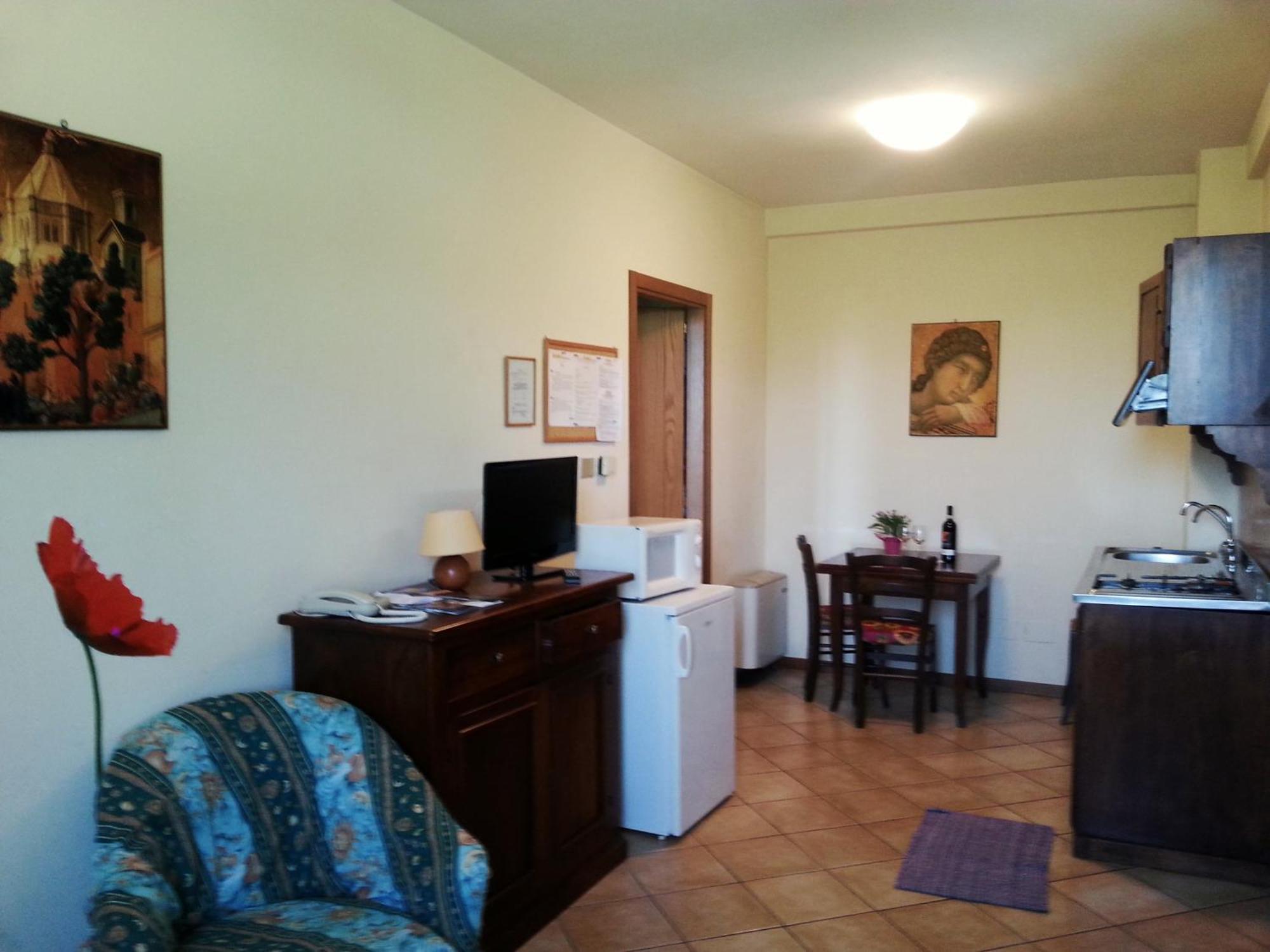 Residence Le Meridiane Siena Szoba fotó